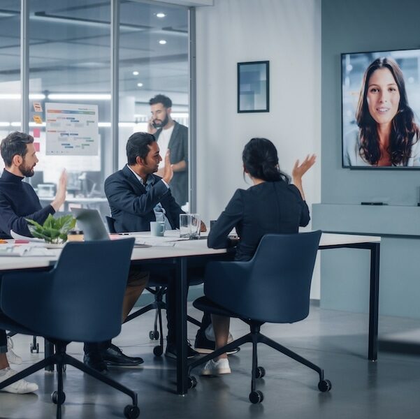 Businesspeople on a web meeting with boss